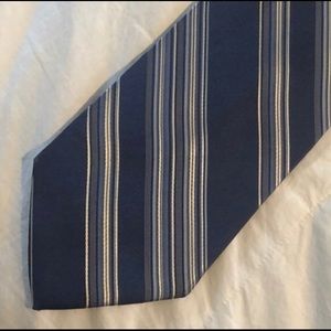 City of London classic blue diagonal stripe in blues, gray and white. 100% silk.